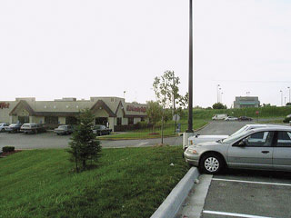 parking areas and low density commercial space with access to roadway