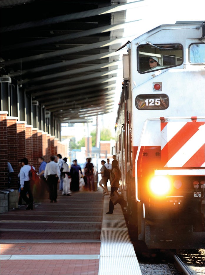 Commuters exiting a commuter train