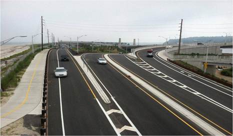 Photo of cars on a road.