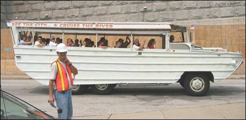 A noise analyst pauses a background noise measurement when a river tour vehicle passes by; this activity is not representative of the typical background level and must be excluded from the measurement.
