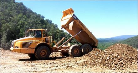 The loading and dumping of fill, at a designated stock pile location, is a cyclical operation. This means it is both a mobile and stationary function that creates noise and both functions are performed in a timed pattern.
