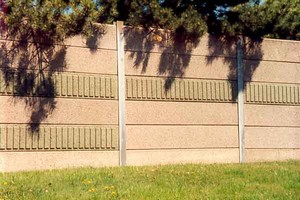 Photo showing delivery and unloading of pre-cast concrete noise barrier panels