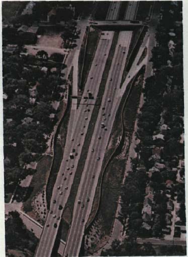overhead view of a highway with serpentine walls