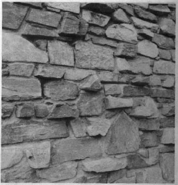Mortared stone wall