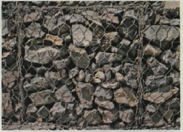 Gabions are essentially wire baskets filled with stone.