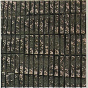 Scored concrete block