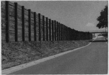 View of barrier in perspective. Note foreshortening effects: verticals seem to blend into a solid dark mass.