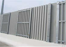 Title: Noise barrier atop a jersey barrier - Description: Noise barrier atop a jersey barrier.