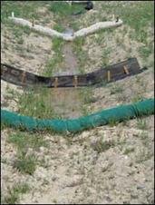 Check dams, an example of a sediment control technique, displayed at the Colorado DOT's Best Management Practices training facility.