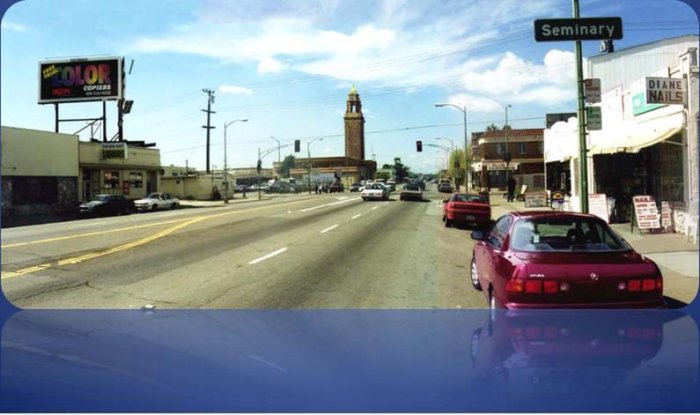Photo of cars on a street.