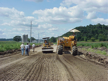 Figure 7-1: Mixing and shaping of fly ash stabilized soil