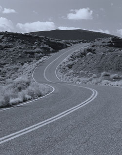 Photo. Open highway in hilly countryside