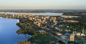 Photo. Aerial view of the University of Wisconsin-Madison and Lake Mendota at sunset.