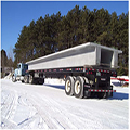 Photo of Precast Concrete Girder Unit is transported to the site.