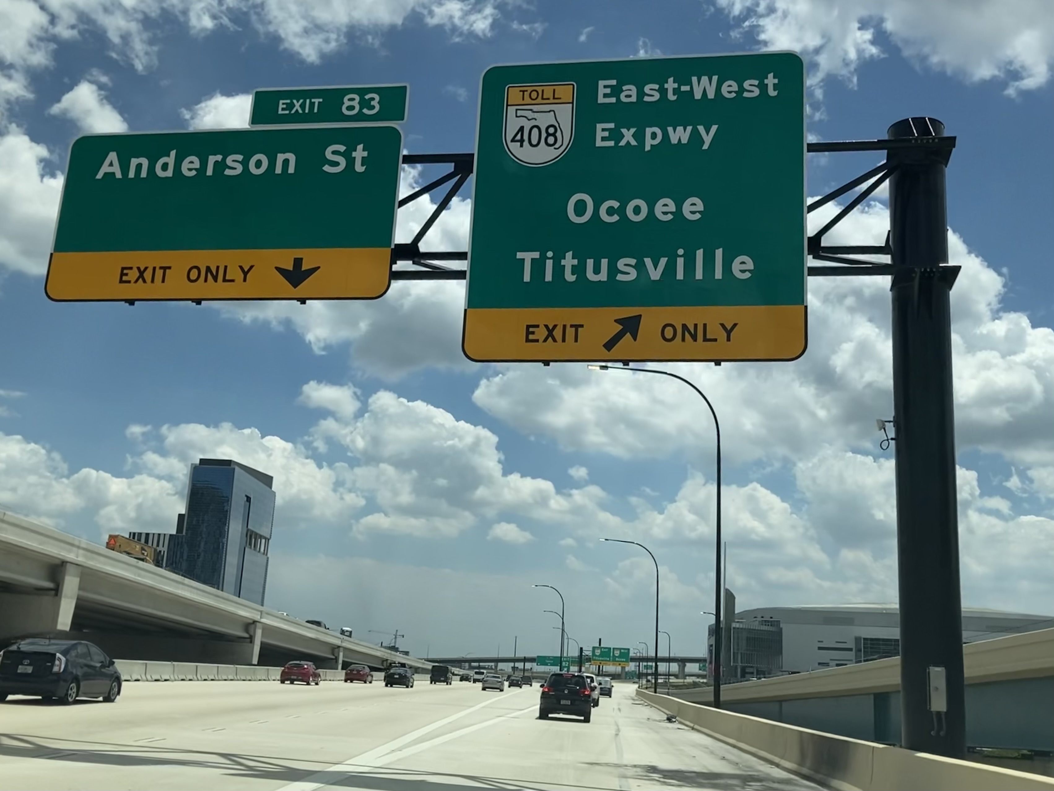 The image depicts an example of structural supports for signage on a controlled access highway.