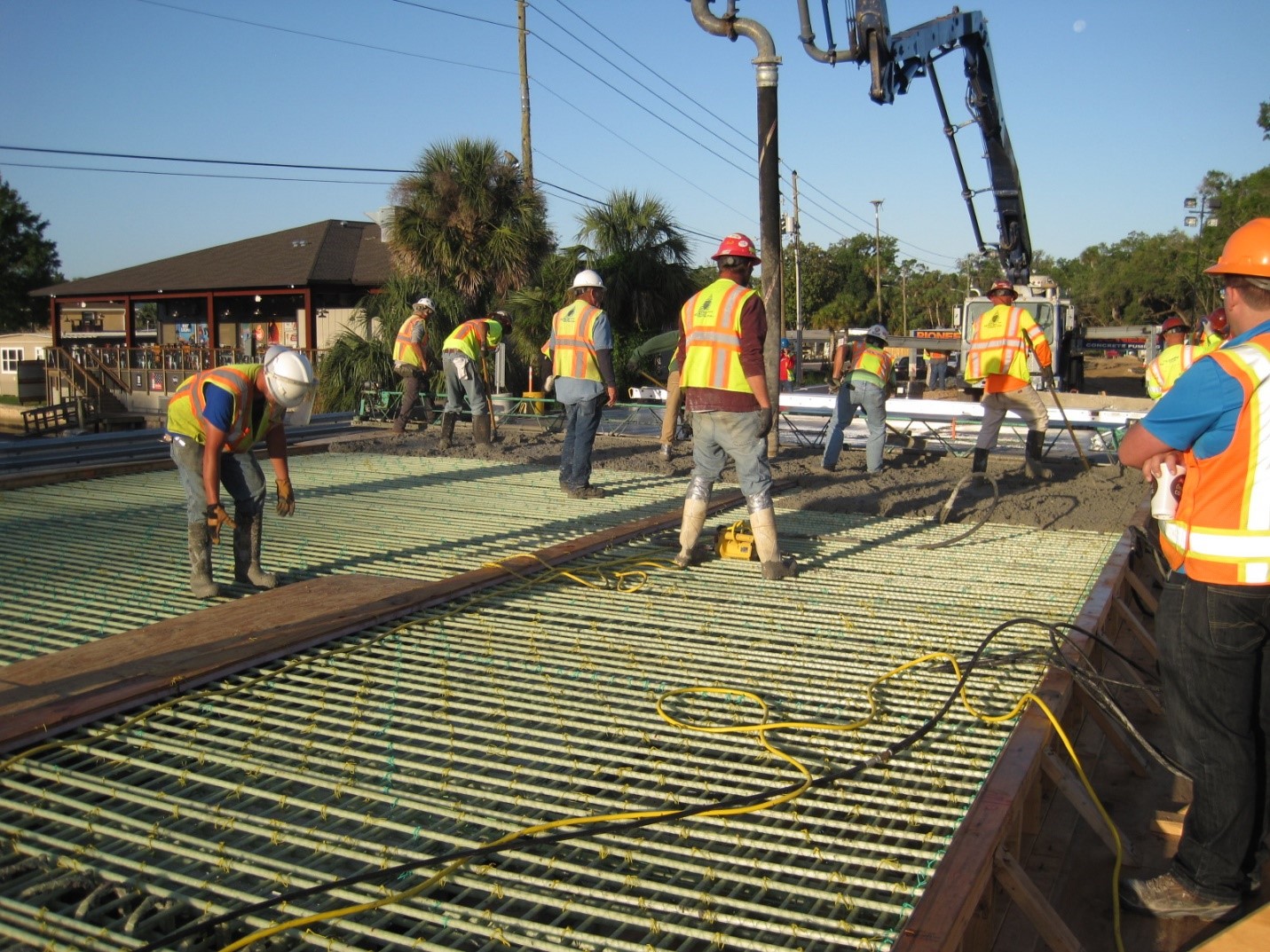 Image 2: This picture depicts casting of GFRP reinforced concrete bridge deck.