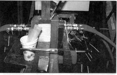 electroslag welding -Close-up View of Consumable Guide Flux Feeding System and Copper Shoes During Welding