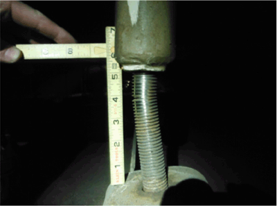 Figure 1 depicts a bent and cracked stainless steel threaded round bar that is about 5 inches long and about 1 inch diameter; this bar was used for supporting the ceiling element. Failure occurred prematurely due to stress corrosion cracking after about 24 years in service in a relatively low stress but highly corrosive environment.