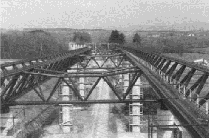 Several pictures showing the Lully Viaduct Bridge during construction.