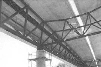 Several pictures showing the Lully Viaduct Bridge during construction.