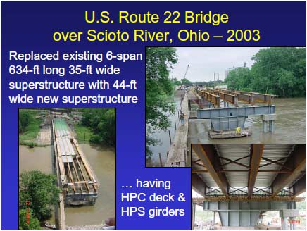 U.S. Route 22 Bridge during construction. Steel girders have been erected on several spans from one end of the bridge. Galvanized permanent metal deck forms are in place on some of the steel girders.