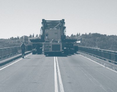 Photograph showing SPMT bridge deck replacement from the rear.