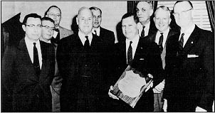 Photo: Francis C. Turner, Clifton W. Enfield, George M.
Williams, Sinclair Weeks, James C. Allen, John A.
Volpe, Arthur C. Clark, Edward H. Ted Holmes, and Charles D. Curtiss.