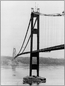 Photo: The first Tacoma Narrows Bridge under construction.