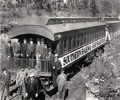 Black and white photograph showing the caboose of the Southern Railway Good Roads Train.