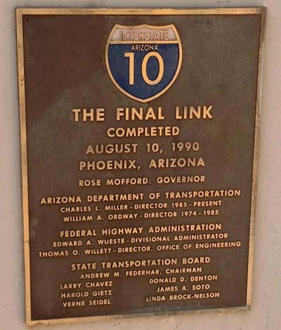 Photograph of the commemorative plaque for the completion of Interstate 10.
