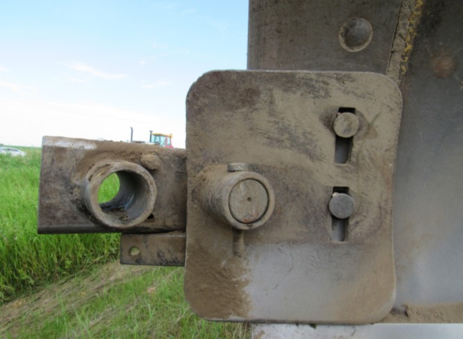 Spring Load Arm Enhancement used in LaMoure County, North Dakota to clear debris from the shoulders of the roadways.