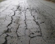 cracked damaged roadway