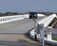 car driving on a roadway that used integrally cured concrete