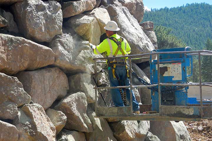 To ensure a good factor of safety, engineers used even larger rocks than the modeling required and grouted the stacked rockery to fill 25% of the voids.