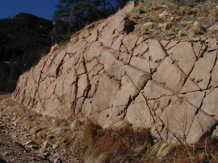 Figure 51. Photo. Shotcrete can be used to protect a slope from erosion-and sculpted to mimic the natural rock face (Ada County Highway District 2003).