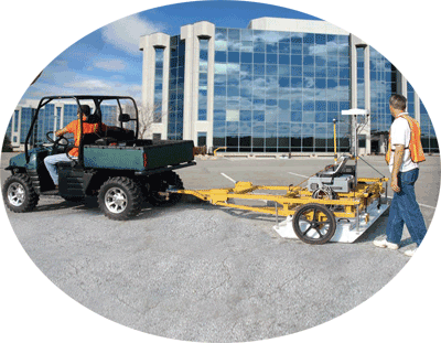 This picture depicts 'designating' and shows an operator searching for subsurface utilities using 3D-Underground Imaging equipment.