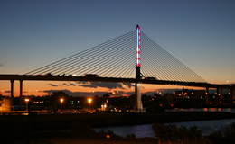 Energy efficient LED lights behind the pylon glass are programmed to provide displays that vary with the seasons and holidays. The flag display is shown on Fourth of July, 9/11 and Veterans’ Day.