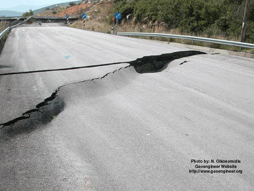 Photo showing slope failure beneath road pavement