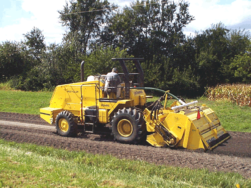 Close up photo of roadway stabilizer/mixer equipment used with chemical (lime or other pozzolanic material) stabilization or modification of subgrade soil.