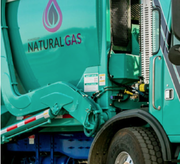 Image shows a portion of a refuse disposal truck powered by compressed natural gas.