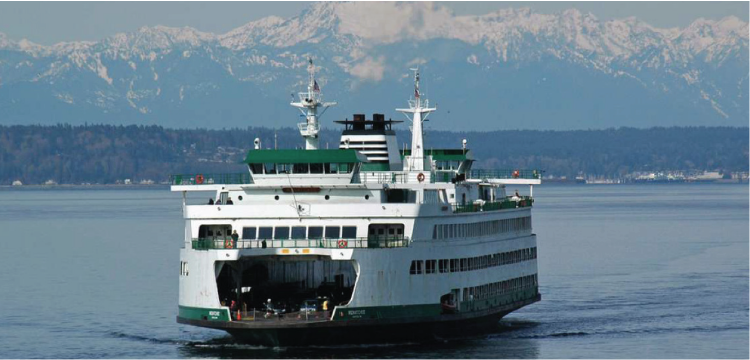 Image shows the Wenatchee ferry carrying passengers on Puget Sound with Mount Rainier in the background.