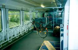 Photo of bike parked on rack on a bus.