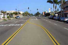 Photo of a road with no median.
