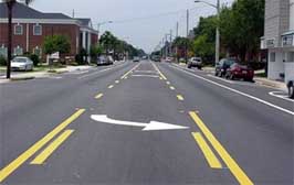 Photo of a road with center turn lane