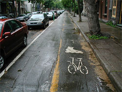 Photo of bicycle facility next to roadway.