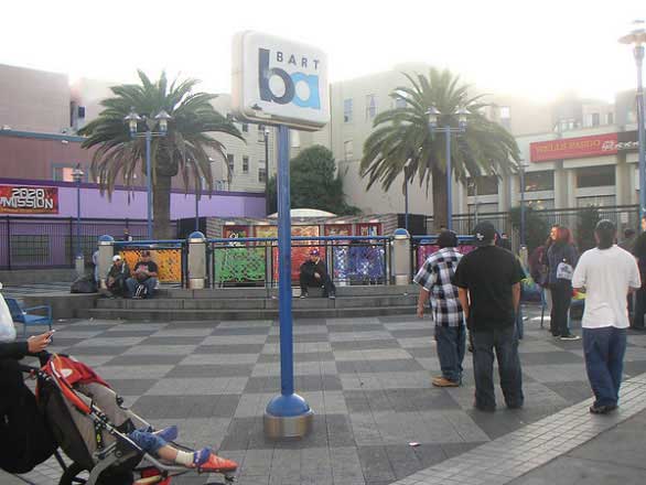 Photo of a walkable downtown area with playgrounds and shopping.