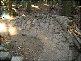 Mountain bike trail features made of stone.