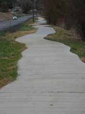 Photo of a paved trail with excessive curves.
