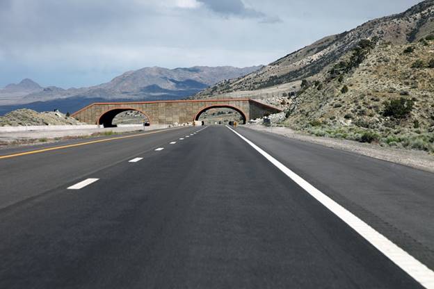 An overpass for wildlife over a four lane highway in rural Nevada