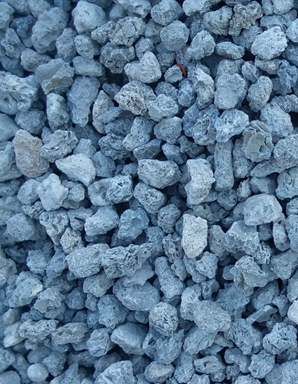 : Marl, lightweight stones, stockpiled at Morris Landing.
